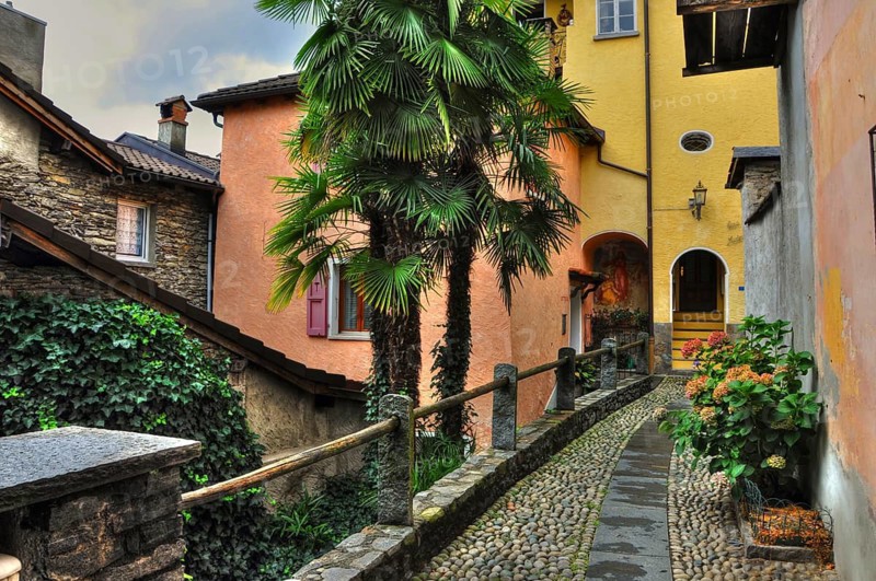 Patio with Walkway and Old Rustic Houses in City of Ronco sopra Ascona Ticino, Switzerland
