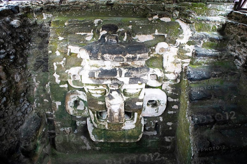 Head of a ruler in Tikal National Park, archaeological site, Petén Department, Guatemala