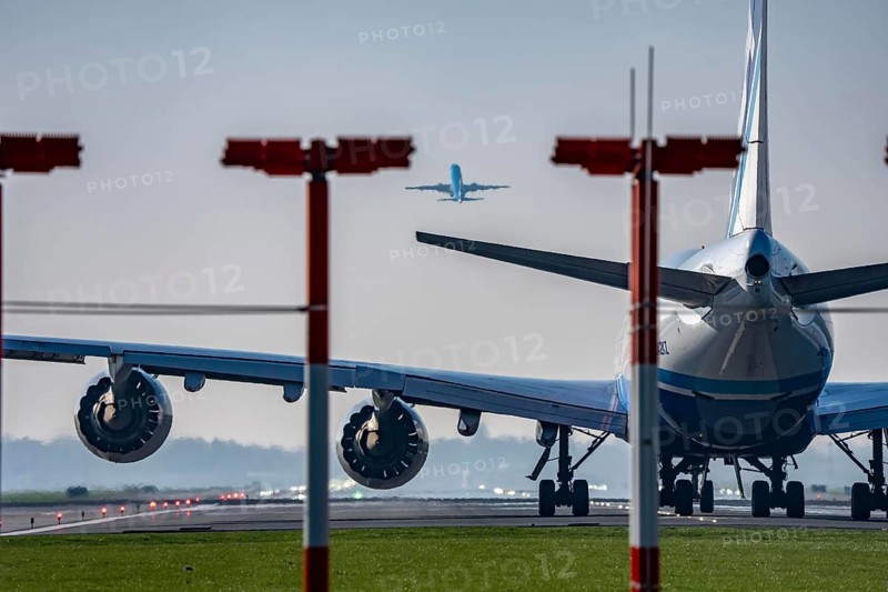 Amsterdam Schiphol Airport, Aalsmeerbaan runway, 18L-36R, aviator on runway, waiting for takeoff, other aircraft on takeoff, Boeing 747, jumbo jet, Nippon Cargo, Netherlands