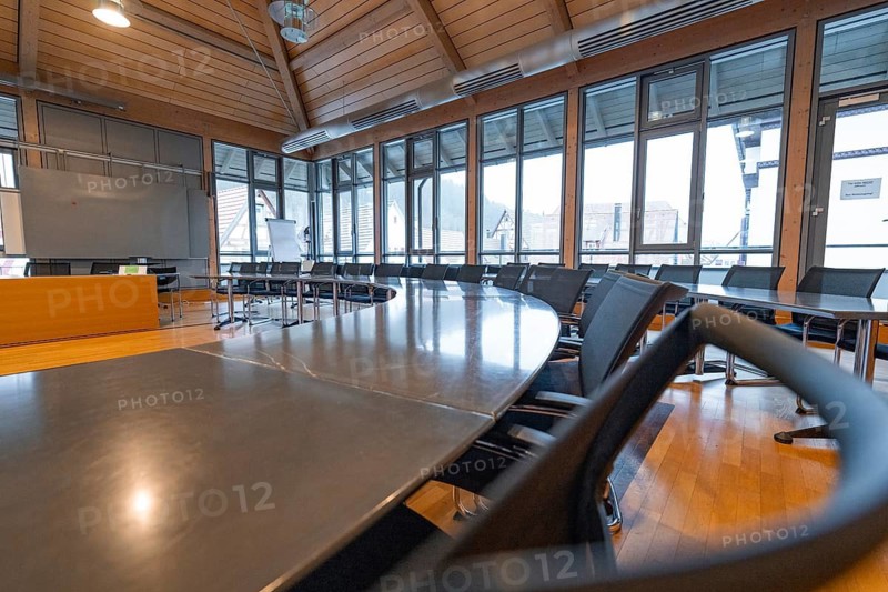 Spacious meeting room with large wooden table and windows, ideal for bright meetings, Nagold Town Hall, Black Forest, Germany