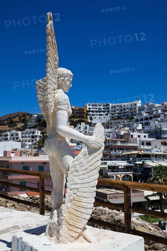 Icarus monument at the harbour of Agia Galini, South Crete, Crete, Greece