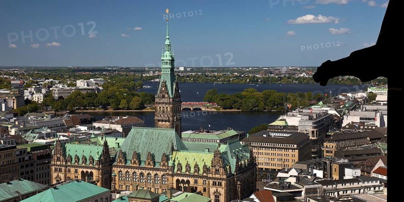 City view from above from the tower of the St. Nikolai memorial with the town hall and the Alster, Hamburg, Germany
