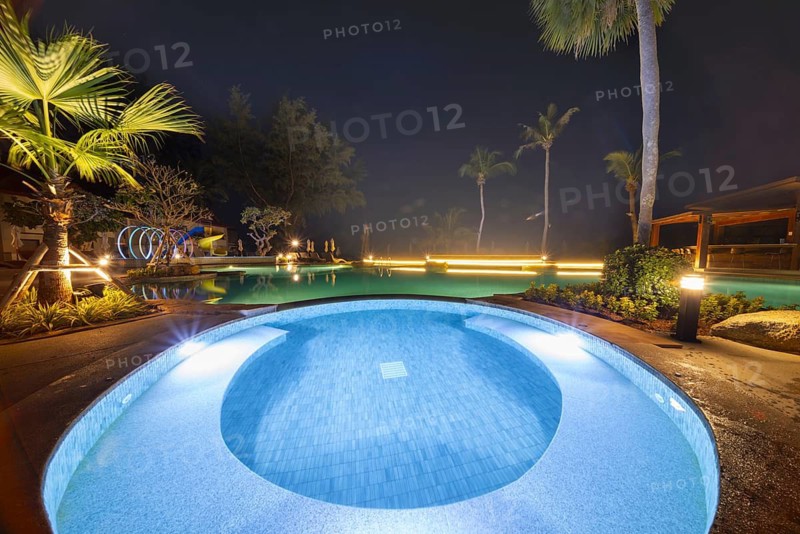 Illuminated swimming pool on Koh Chang Island, Andaman Sea, Southern Thailand, Thailand