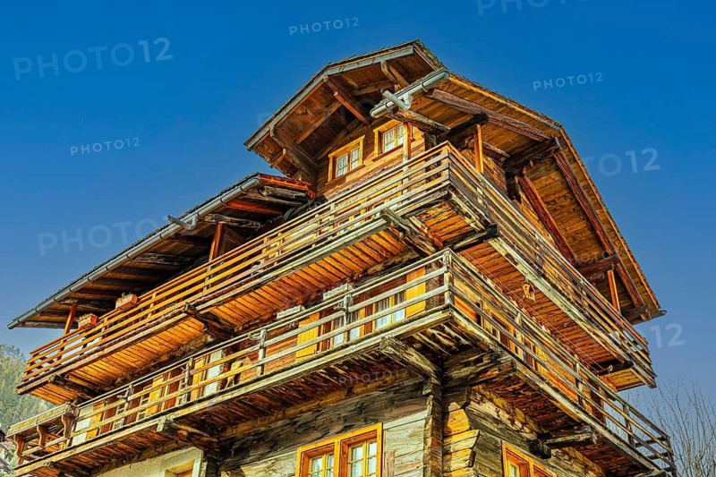 Multi-storey old farmhouse with surrounding balconies, historic town center, Grimentz, Val d'Anniviers, Valais Alps, Canton of Valais, Switzerland