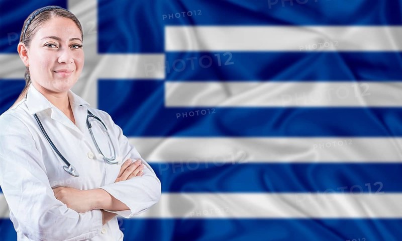 Female doctor on Greece flag. Doctor with crossed arms on Greece flag. Greece Health and Care concept
