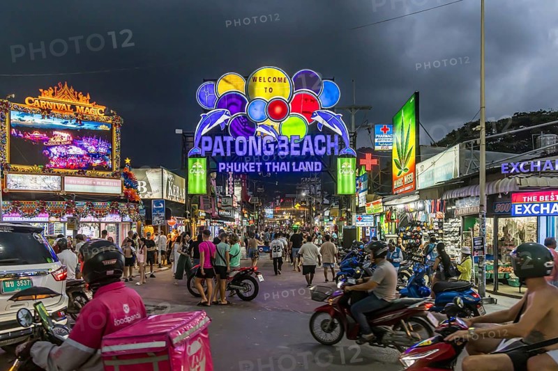 Crowds of people on Bangla Street in the evening. Nightlife on Bangla Walking Street with go-go bars, clubs, cannabis bars and extreme loudness. Patong, Kathu, Phuket Island, Thailand