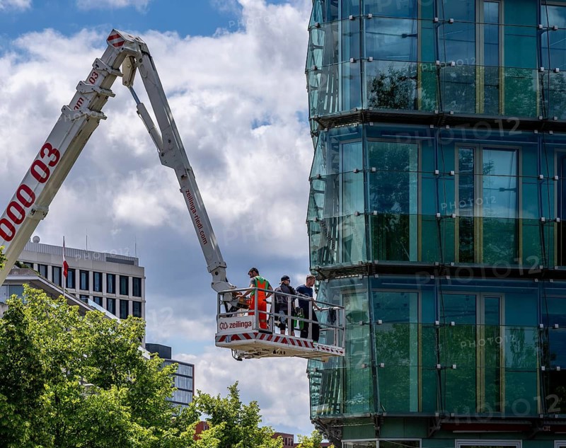 Craftsman with lifting platform, office complex at Potsdamer Platz, Berlin, Germany