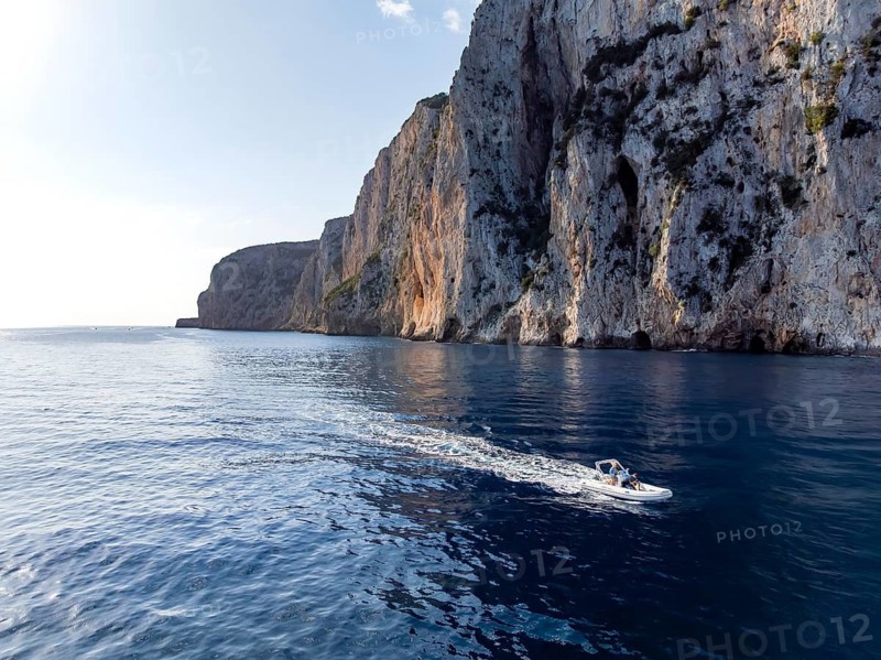 Motorboat rides on picturesque rocky coast ImmorgenLicht, cliffs, Golfo di Orosei, Baunei, Sardinia, Italy