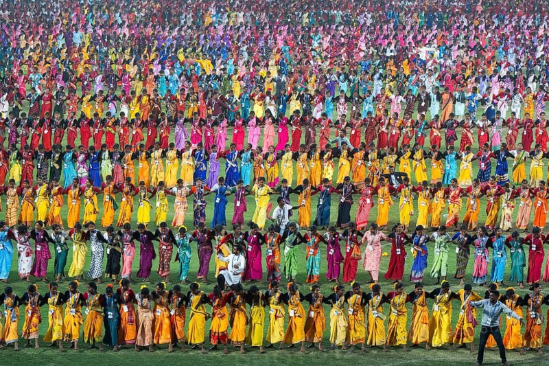 Several thousands of dancers perform traditional Jhumur dance, as they rehearse for the upcoming 'Jhumoir Binandini' event at the Sarusajai Stadium in Guwahati, India on February 22, 2025. Jhumur is a traditional folk dance of Assam, mainly performed by the Adivasi (Tea Tribe) community working in the tea gardens of the state