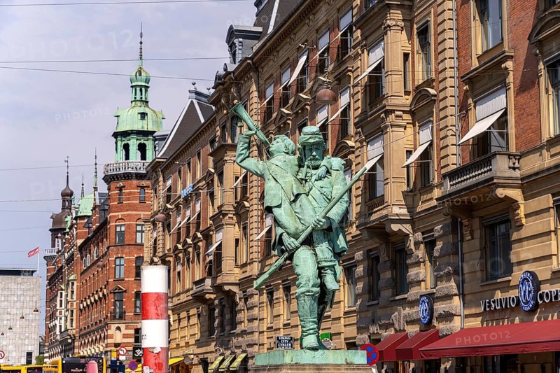 Statue The country soldier with the little hornblower med den lille hornblæser) on City Hall Square, Copenhagen, Denmark