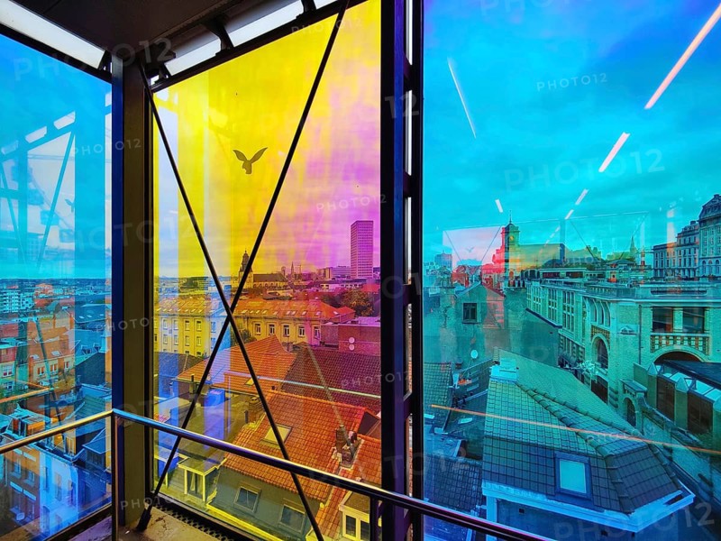 Marollescenece, art installation The Cube, coating of the windows with translucent dichroic films, Poelaert, Brussels, Belgium