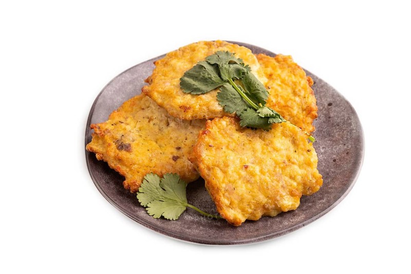 Fried crispy Chicken pancakes isolated on white background. side view, close up