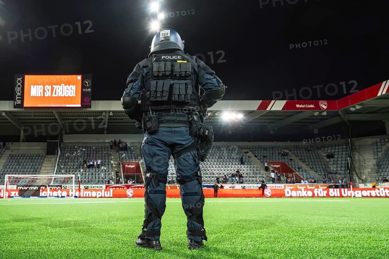 Police officer in combat gear Football stadium