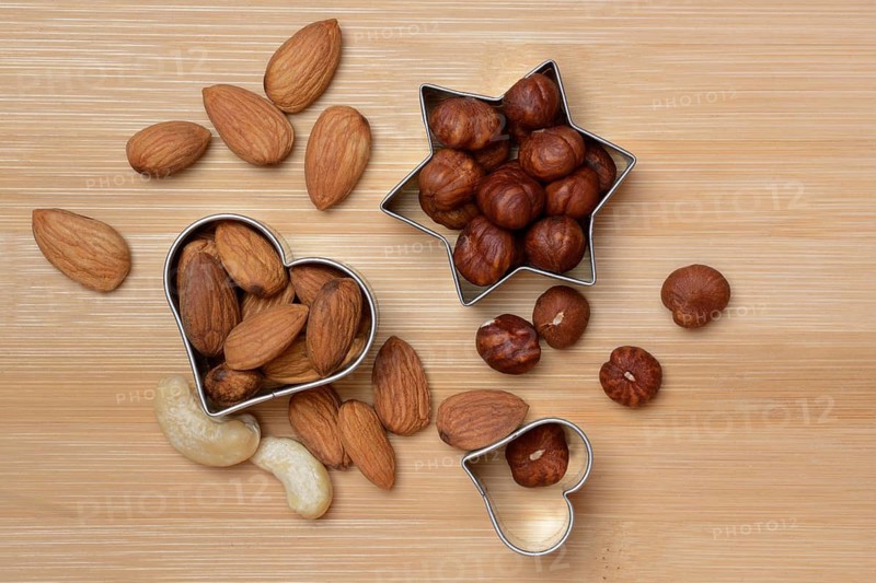 Nuts and cookie cutters, almonds, cashews and hazelnuts