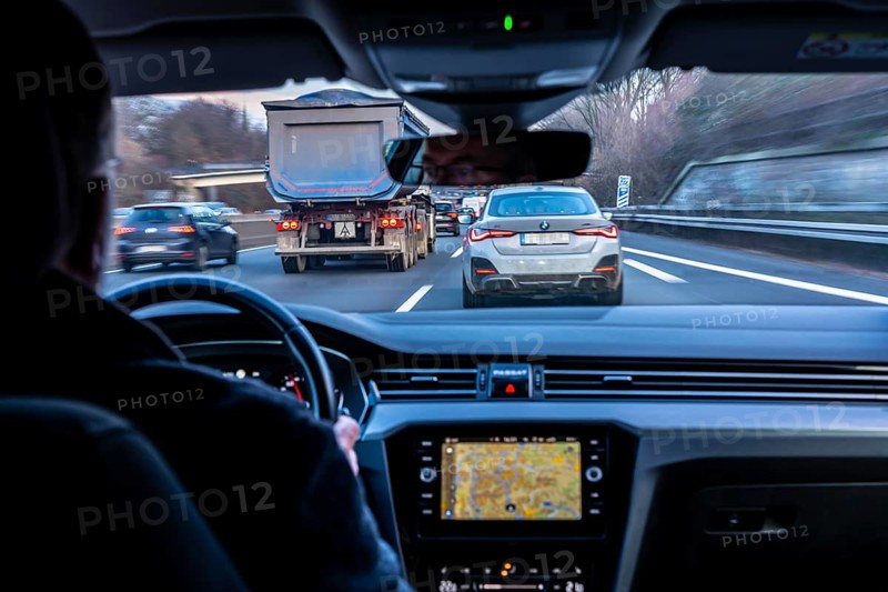 Driving on the A40 motorway, Ruhrschnellweg, in heavy traffic, drivers' perspective, Essen, North Rhine-Westphalia, Germany