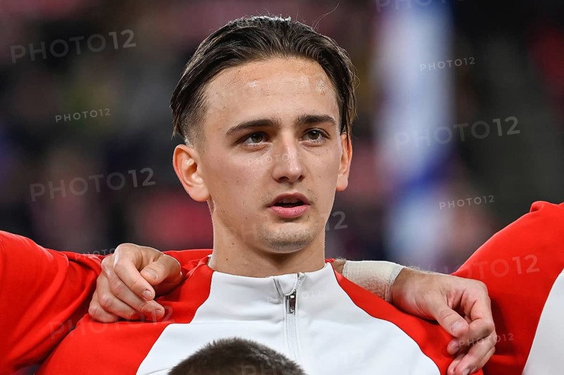 PRAGUE, CZECH REPUBLIC - MARCH 24, 2023: Qualifications for UEFA Euro 2024. Match Czech Republic - Poland 3:1. Michal Karbownik during anthem.