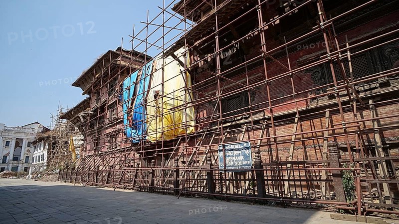Historic buildings with scaffolding secured by support beams in Kathmandu, Durbar Square, shortly after the earthquake, Kathmandu, Nepal