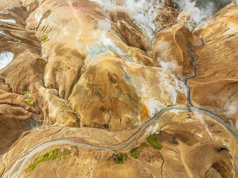 Steaming hot springs and colourful rhyolite mountains, aerial view, Hveradalir geothermal area, Kerlingarfjöll, Icelandic highlands, Iceland