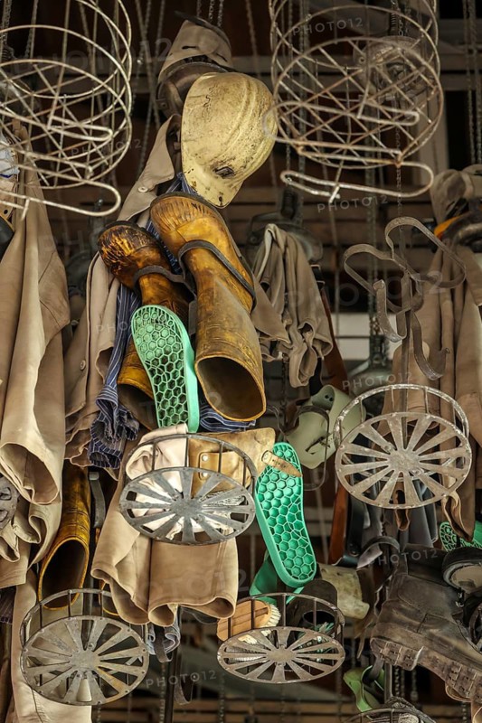 Dortmund, North Rhine-Westphalia, Germany - LWL-Industriemuseum Zeche Zollern. Miners' clothing hangs in baskets under the ceiling in the former washing room. The Zollern colliery is a disused coal mine in the north-west of the city of Dortmund, in the Bövinghausen district