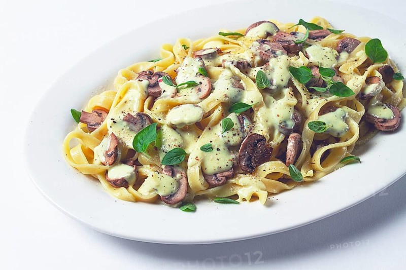 Fettuccine with champignons, basil, in cream sauce, homemade, no people