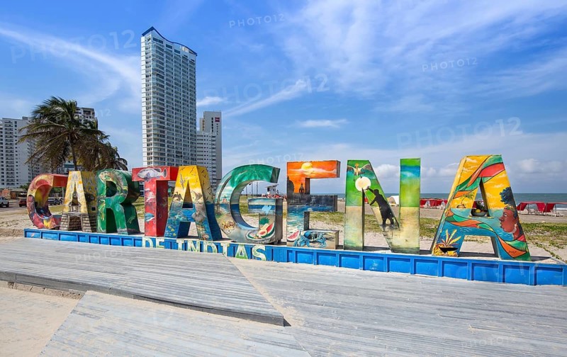 Cartagena, Colombia – 18 December, 2019: Big welcoming Cartagena letters on a public beach near the Walled City (Ciudad Amurallada)