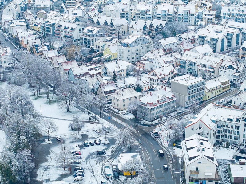 Detailed view of a snow-covered residential neighbourhood with streets and trees, Sindelfingen, Germany