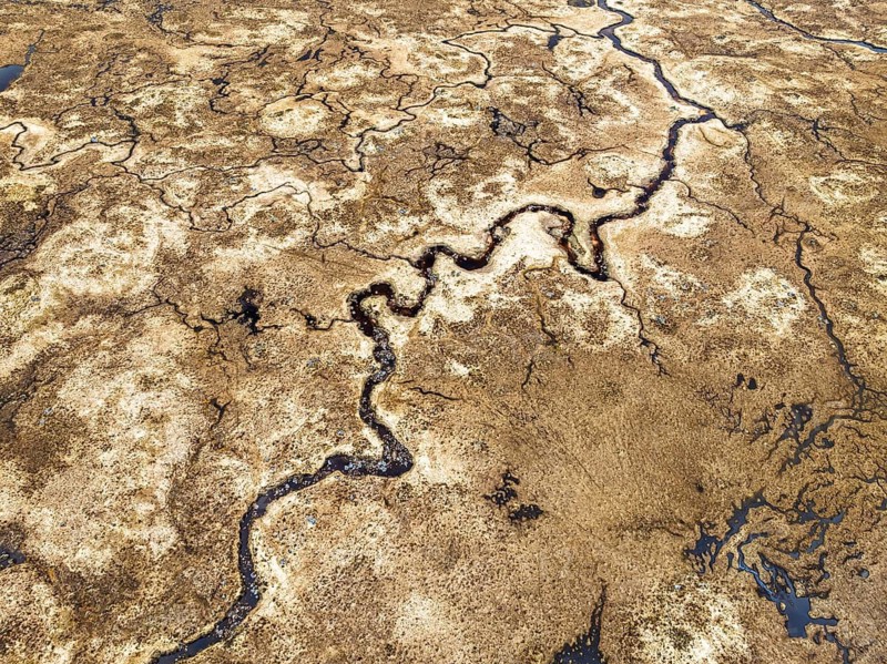 Top Down over Rannoch Moor from a drone, Loch Ba and Loch of the Armpit, A82 Highland Way, Argyll and Bute, West Highlands, Scotland, United Kingdom