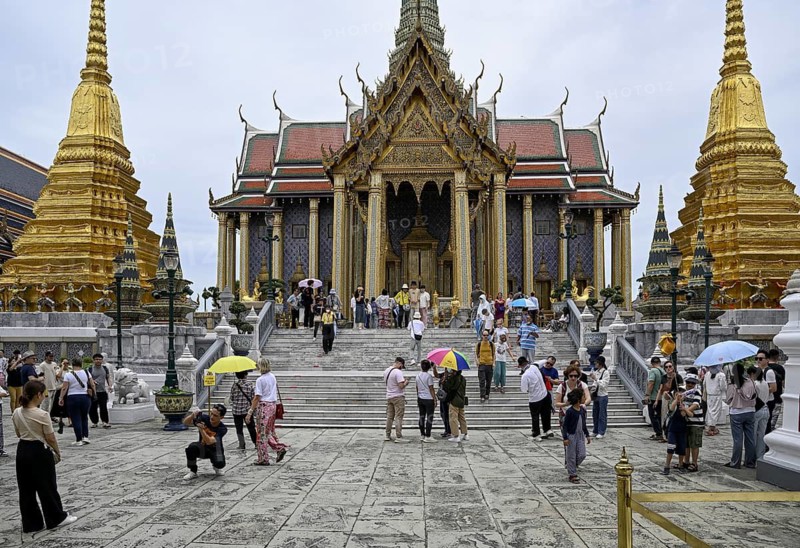 Tourists at Wat Phra Kaew, Temple of the Emerald Buddha, Bangkok, Thailand