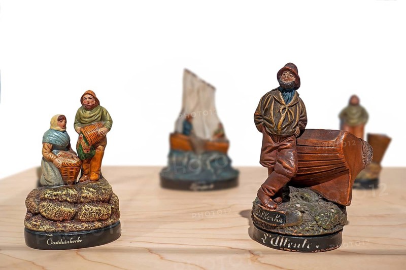 19th, 20th century statuettes of Flemish fishermen from Oostduinkerke and Middelkerke sold to tourists as souvenirs along North Sea coast, Belgium