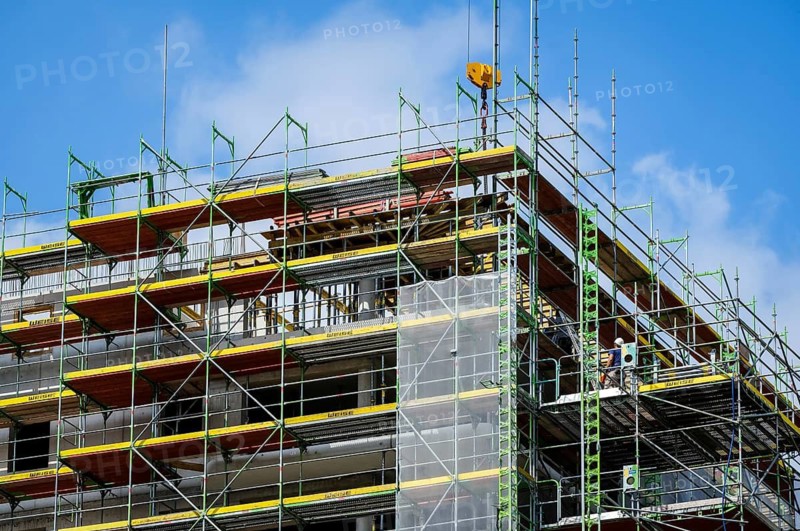 Essen, North Rhine-Westphalia, Germany - Scaffolding on the new building site of a high-rise block of flats