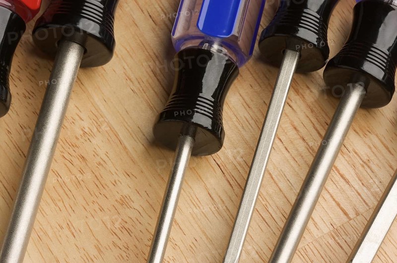 Macro Abstract of Tools on a Wood Background