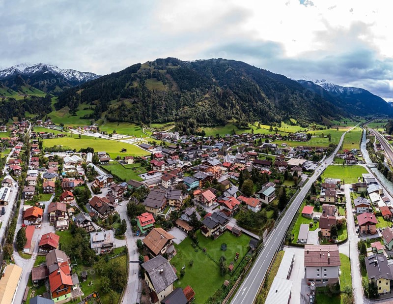 Drone image, residential buildings, view of village with parish church, Dorfgastein, Gasteinertal, Pongau, Salzburg province, Austria
