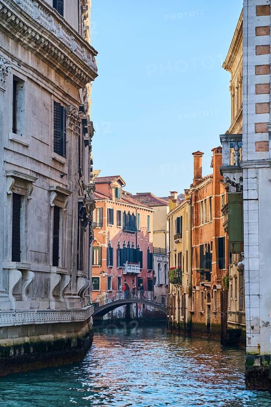 View from 'Canal Grande' on bridge going over a waterway 'Rio san luca' in Venice on a sunny day in winter, Italy