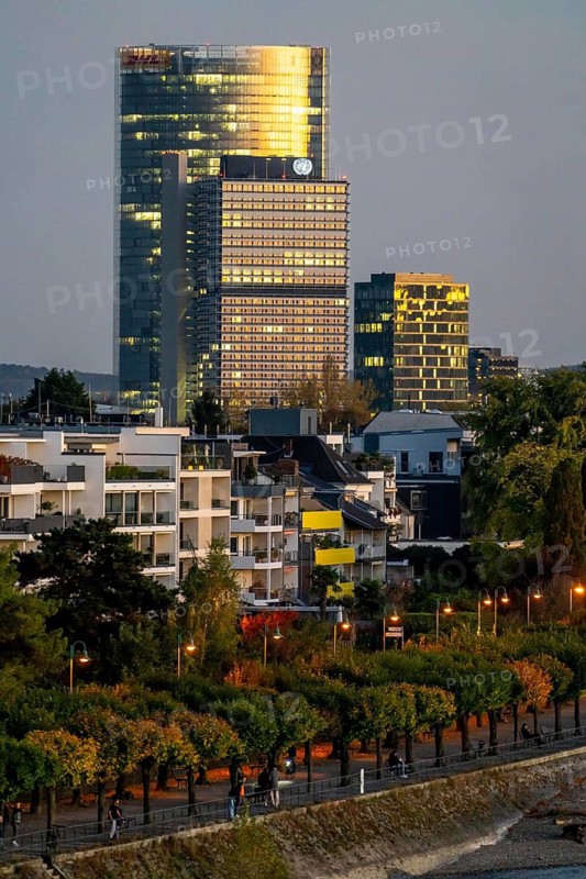 Skyline Bonn on the Rhine, in front the UNFCCC Secretariat of the Framework Convention on Climate Change, in the centre the high-rise building of the United Nations, Campus Bonn, behind it the Posttower, corporate headquarters of Deutsche Post, Rhine bank Bonn-Beuel, North Rhine-Westphalia, Germany