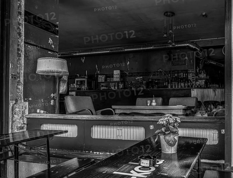 Black and white photograph, view into a bar at the Schlesisches Tor in Berlin, Germany