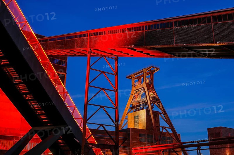 UNESCO World Heritage Zollverein Coal Mine Industrial Complex illuminated in red in the evening, Essen, Ruhr Area, North Rhine-Westphalia, Germany