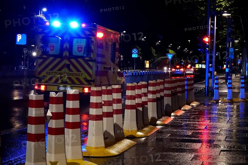 Security barrier for an event, large city at night, Germany