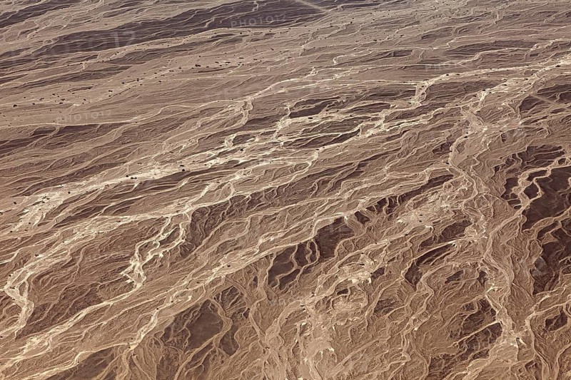Details of a desert landscape with eye-catching textures and lines, photographed from the air, The landscape and desert near Nasca in the Andes of Peru