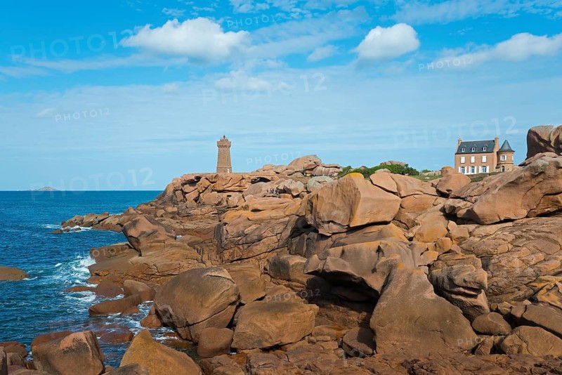 Majestic rocks on the coast with a lighthouse and a house in the distance, Phare de Men Ruz and Maison Gustave Eiffel, Ploumanac'h, Ploumanach, Pointe de Squewel, Perros-Guirec, pink granite coast, Côte de Granit Rose, Brittany, France