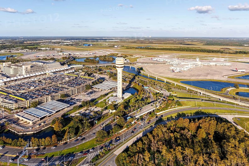 Aerial view of Orlando International Airport with Terminal Concourse Airside 4 and Tower in Orlando, USA