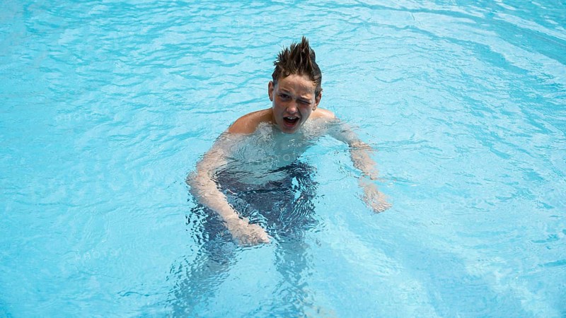 Thirteen-year-old boy, swimming pool