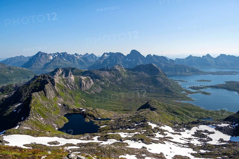 Mountains and fjord landscape, view from the summit of Rundfjellet, fjord Austenesfjord and lake Hellskarvatnet, Svolvaer, Nordland, Norway