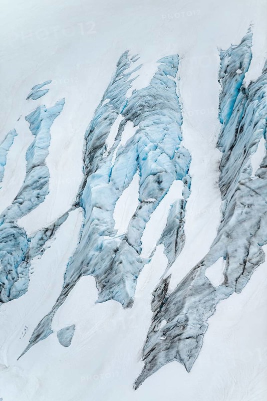 Blue rugged glacier ice with crevasses and snow, detail, Exit Glacier, Kenai Peninsula, Alaska, USA