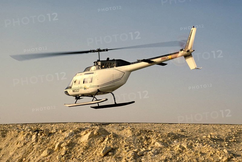 Oil industry in the Ras Tanura area, Saudi Arabia, Bell 206 JetRanger helicopter 1979