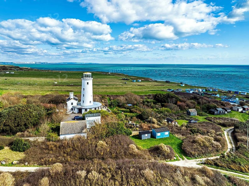 Portland Bird Observatory from a drone, Bill Lighthouse, Portland Bill, Isle of Portland, Dorset, England, United Kingdom