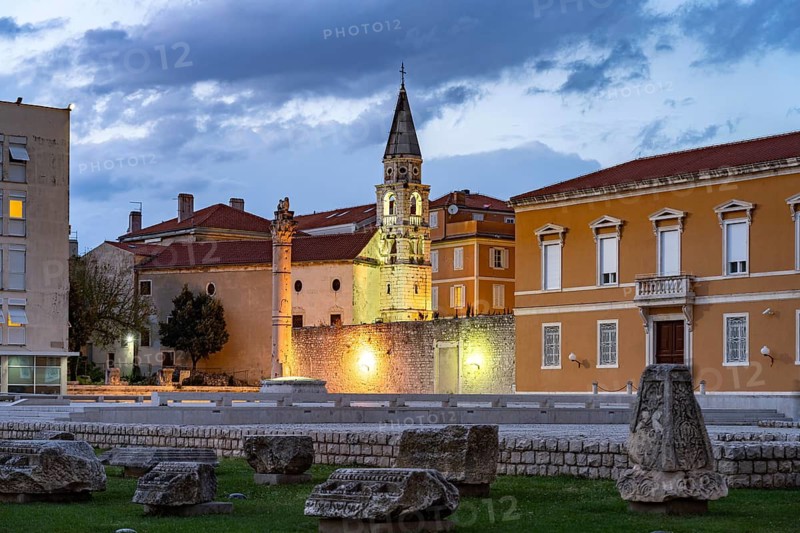 The Pillar of Shame and the Orthodox Church of St Elias in Zadar at dusk, Croatia