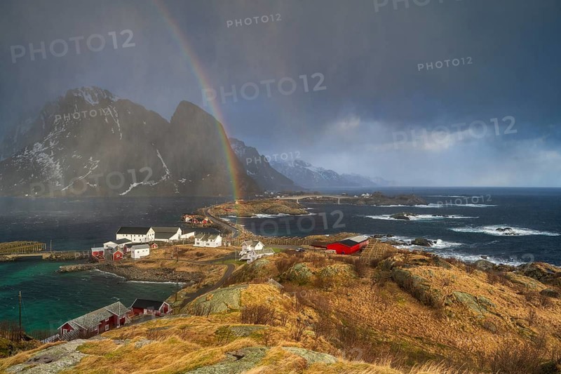 Thunderstorm atmosphere and rainbow over the islands Sakrisøy and Hamnøy, Reine, Moskenesøya, Lofoten, Norway