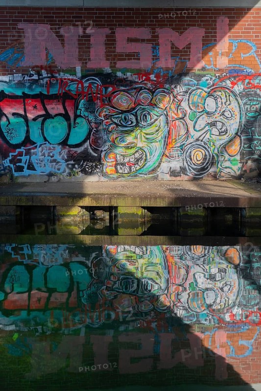 Grafitti under the city railway bridge at Linderner harbour, lock, canal, reflection, Limmer, Hanover, Lower Saxony, Germany