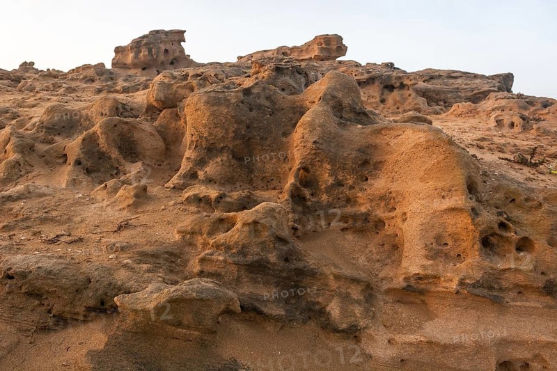 A rocky area with a hole in the ground. Rabat, Morocco