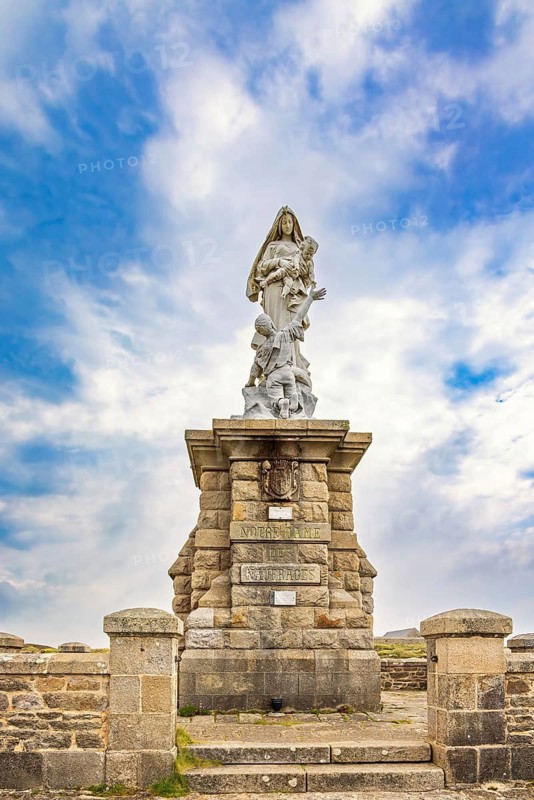 Notre-dame des naufragés sculpture at Pointe du raz with a scenic cloudscape view Finistère., Pointe du raz, Bretange, France